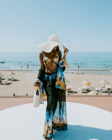 Woman in stylish beachwear on a sunny day