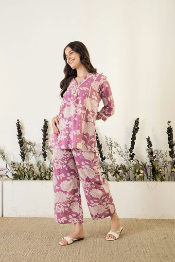 Woman wearing a floral print pajama set
