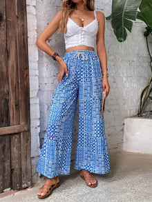 Pantalon palazzo imprimé à taille haute avec cordon de serrage