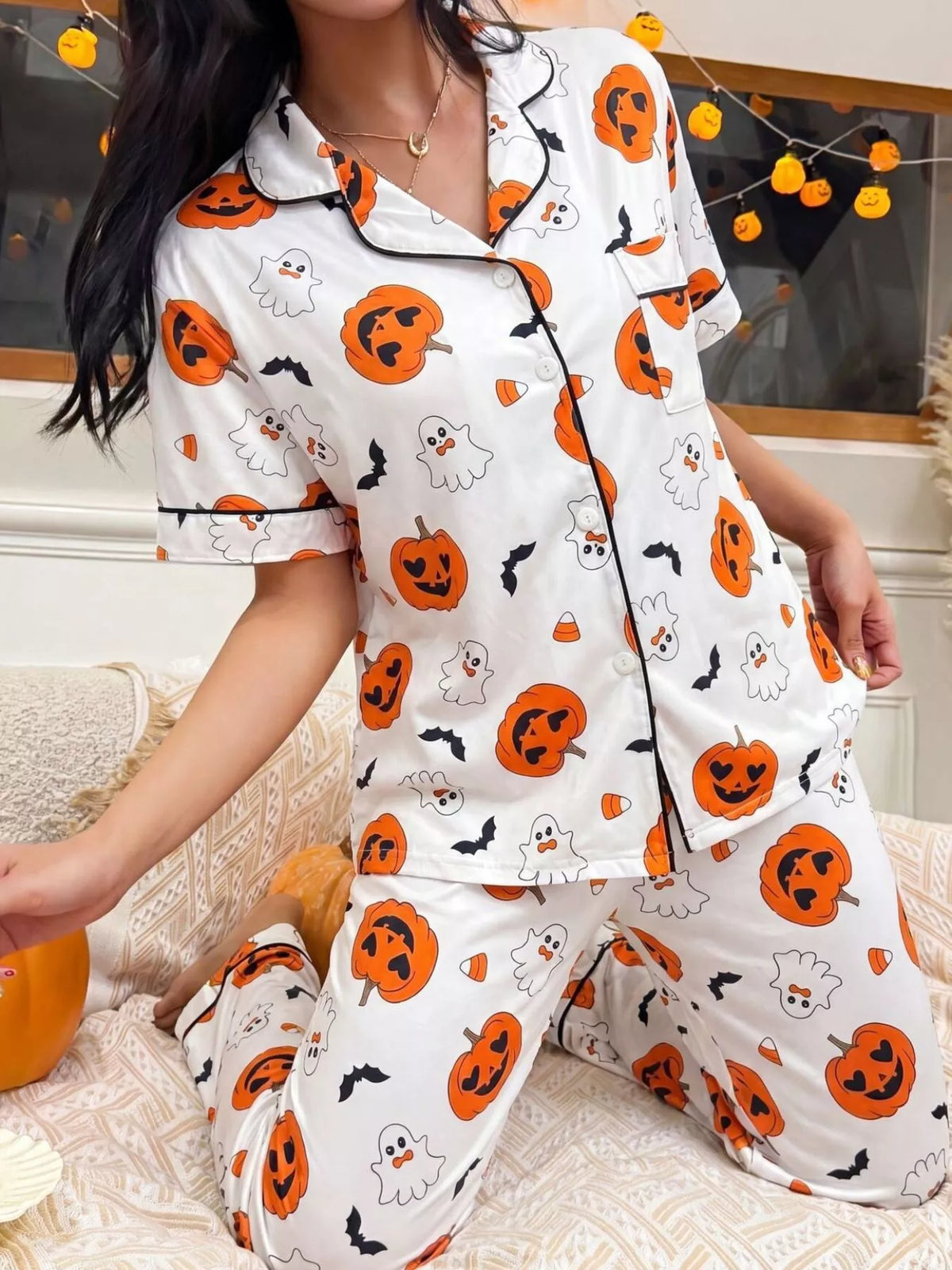 Pigiama con pantaloni e camicia di Halloween con zucche