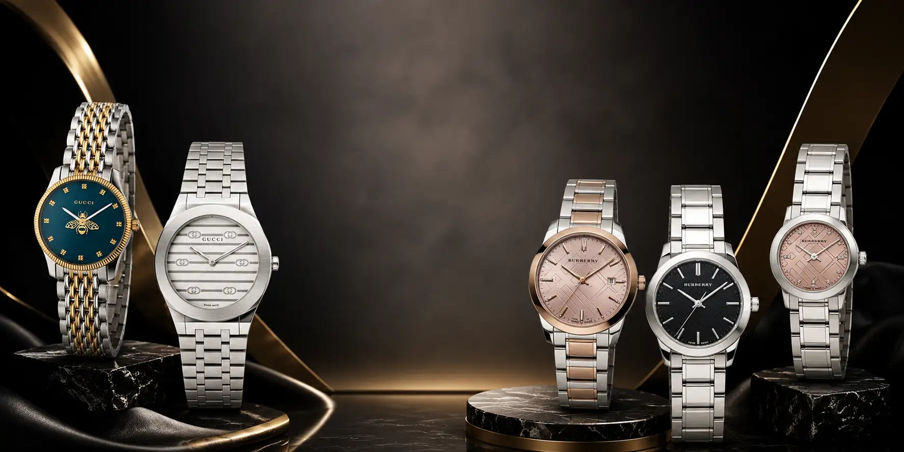 Six luxury wristwatches from Cartier are displayed on black marble pedestals against a dark, elegant background. The collection includes various models with silver, gold, and rose gold-tone metal bracelets and dials in blue, white, pink, and black.